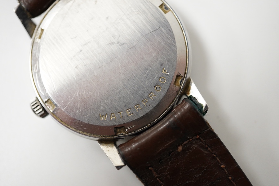 A gentleman's early 1970's stainless steel Omega manual wind wrist watch, on an associated leather strap, case diameter 35mm. Condition - poor to fair